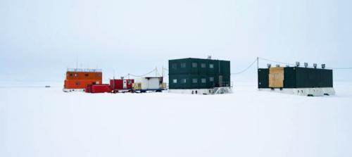 Hawke's Hut is the double story green building in the centre (Photo: Tony Fleming)